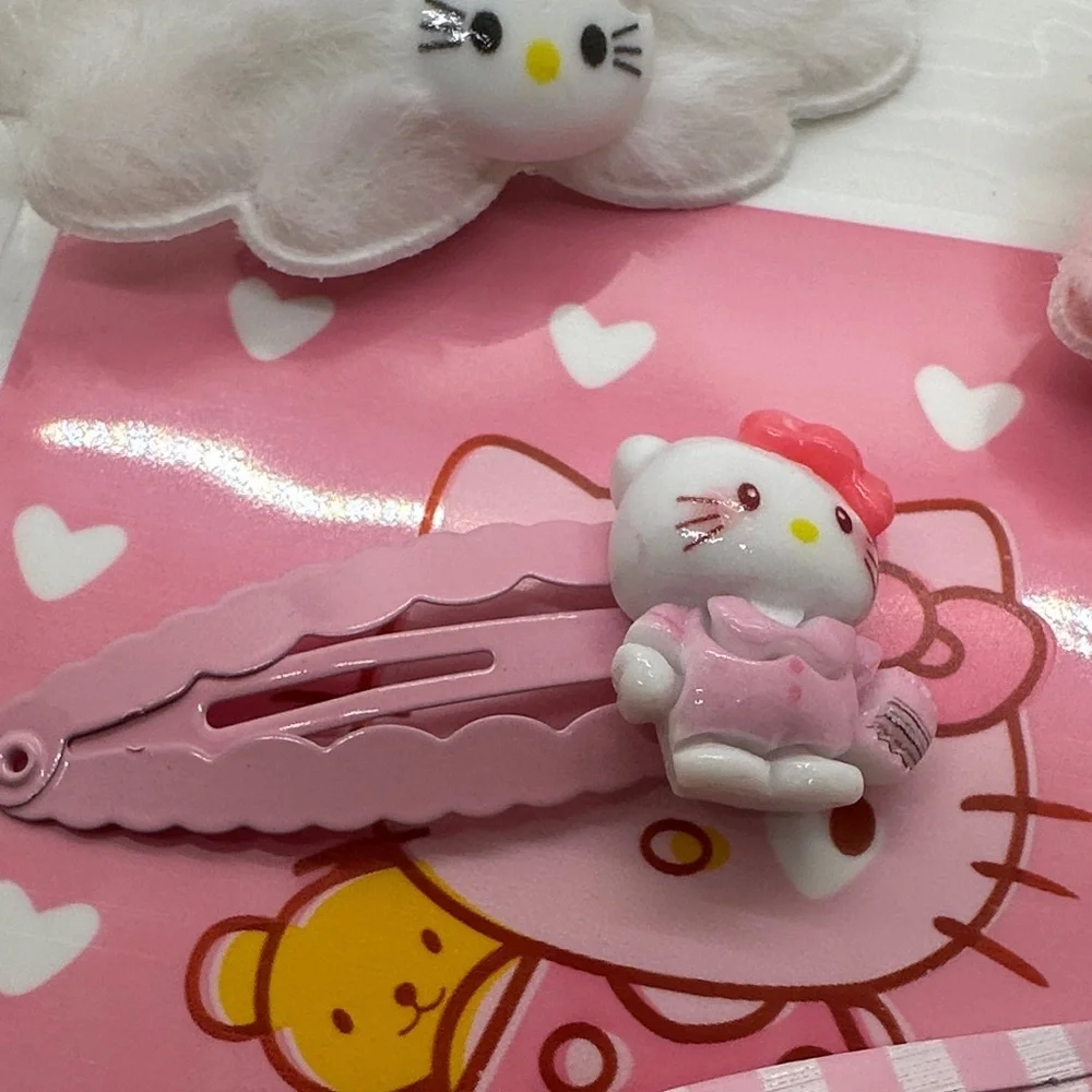 3/$15 🌼 Hello Kitty Pink and White Hair Clips Set